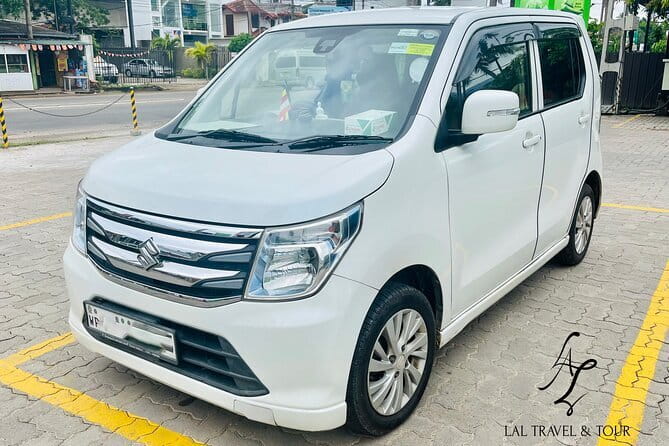 Colombo Airport Pickup and Drop-off Transfer - Inside the Ride: Air-Conditioning, Bottled Water, and Fees Already Covered