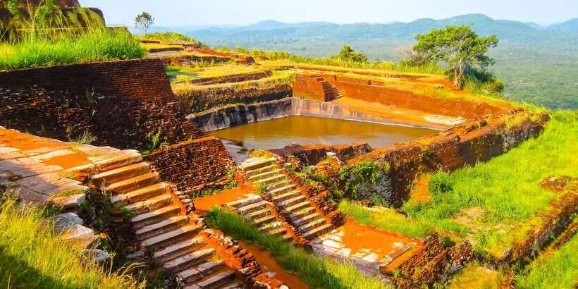 From Negombo: Sigiriya and Dambulla Day Trip and Safari - The Sigiriya Lion Rock climb: 1,200 steps and the Mirror Wall payoff