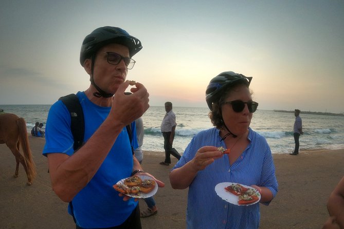 Luxury Night Cycle Tour of Colombo - The Fort Area stops: Dutch Hospital, colonial edges, and a few dark details