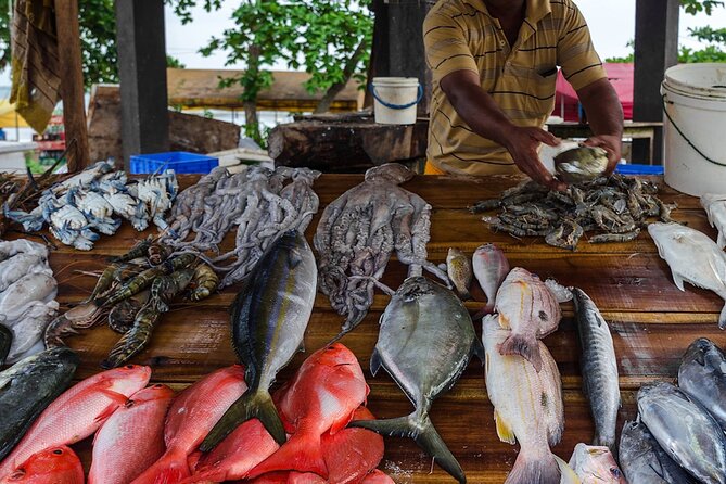 Negombo City Tour - Angurukaramulla Temple: Buddha statue, dragon entrance, and Rs. 1000 ticket