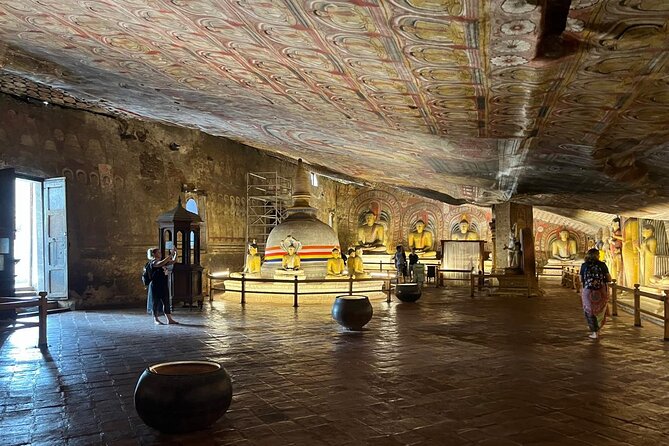 Sigiriya Fortress & Dambulla Day Tour From Colombo, Bentota Area - Golden Temple of Dambulla Caves: Buddha Statues and Frescoes