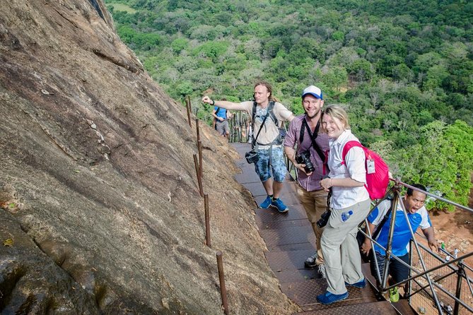 Sigiriya Rock and Dambulla Cave All Inclusive Private Day Trip - Dambulla Cave Temple: painted caves and a colossal Buddha
